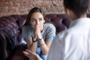 Young woman with therapist