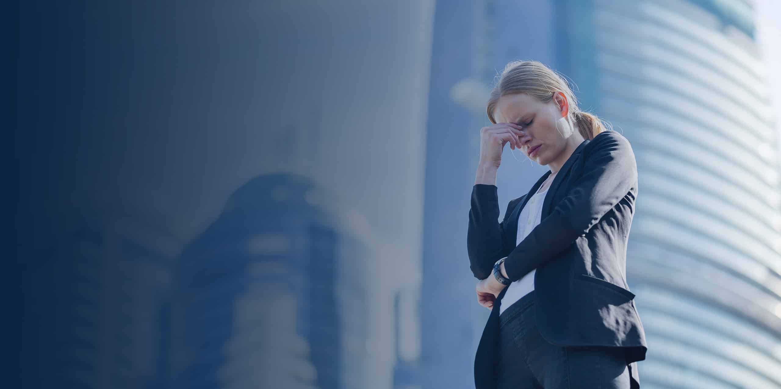 Stressed business woman in the city